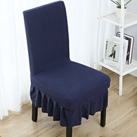 The chair cover has a skirt, is thick, stain-resistant, and elastic.