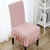 The chair cover has a skirt, is thick, stain-resistant, and elastic.